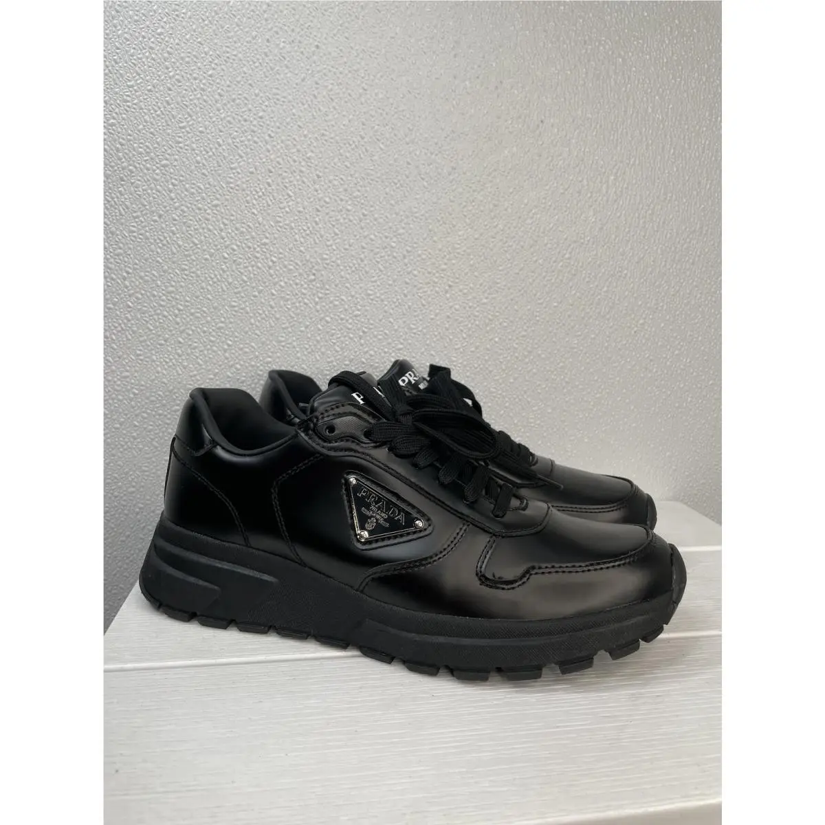 Prada Prax 1 Mens US 8 EU 42 Black Calf Leather Lace Up Logo Casual Sneakers