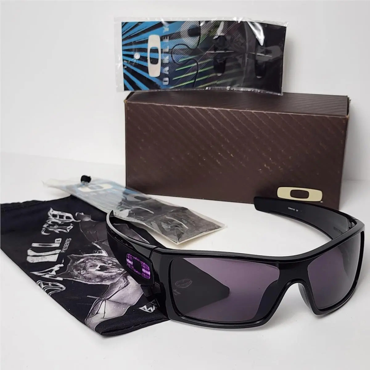 Sunglasses Batwolf 009101-08 Polished Black Frame Warm Grey Lens by Oakley