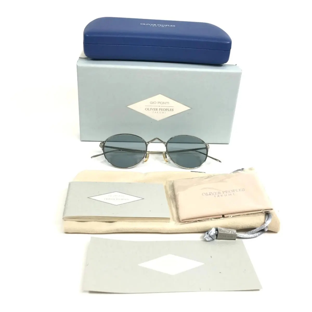x Takumi Sunglasses OV1311ST 5036R5 G. PONTI-4 Silver w Ash Blue by Oliver Peoples