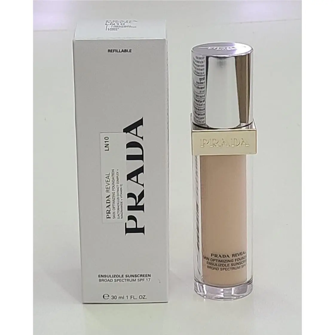 Reveal Skin Optimazing Foundation LN10 Sunscreen SPF17 Refillable 1 fl oz by Prada