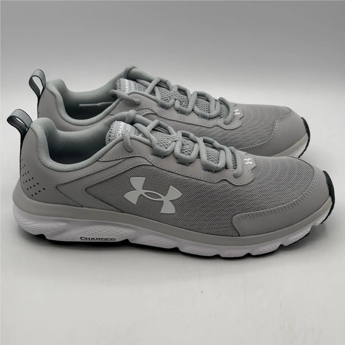 Under Armour Charged Assert 9 Shoes Mens Size 10 Gray White Running 3024590-101