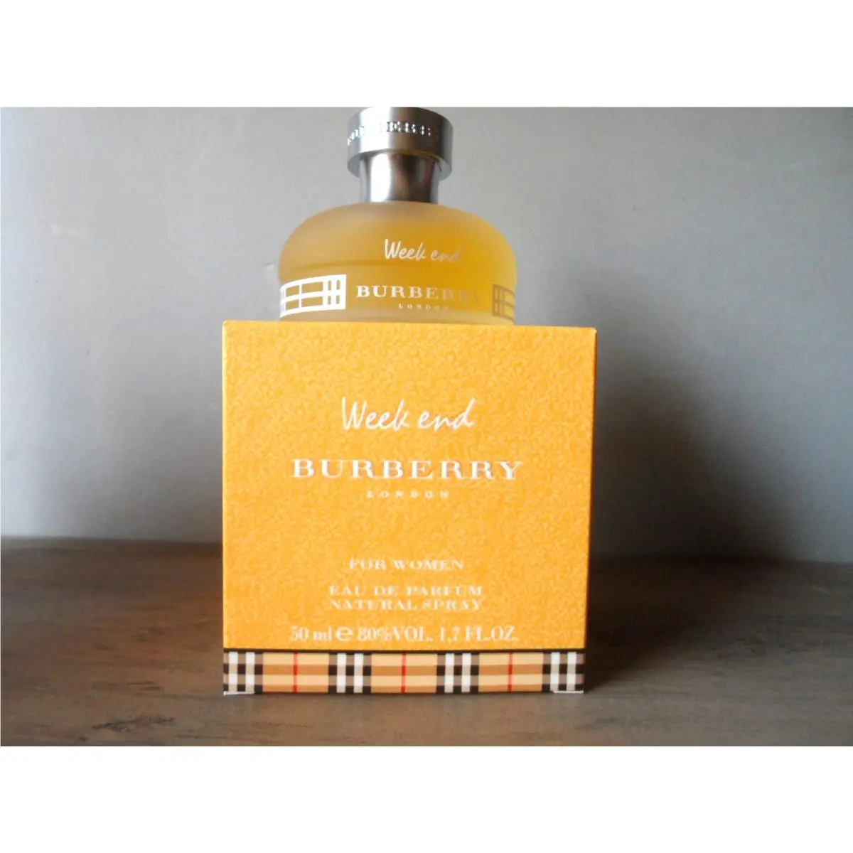 Weekend Women Edp Spray 1.7 oz / 50 ml Vintage Orange Box by Burberry