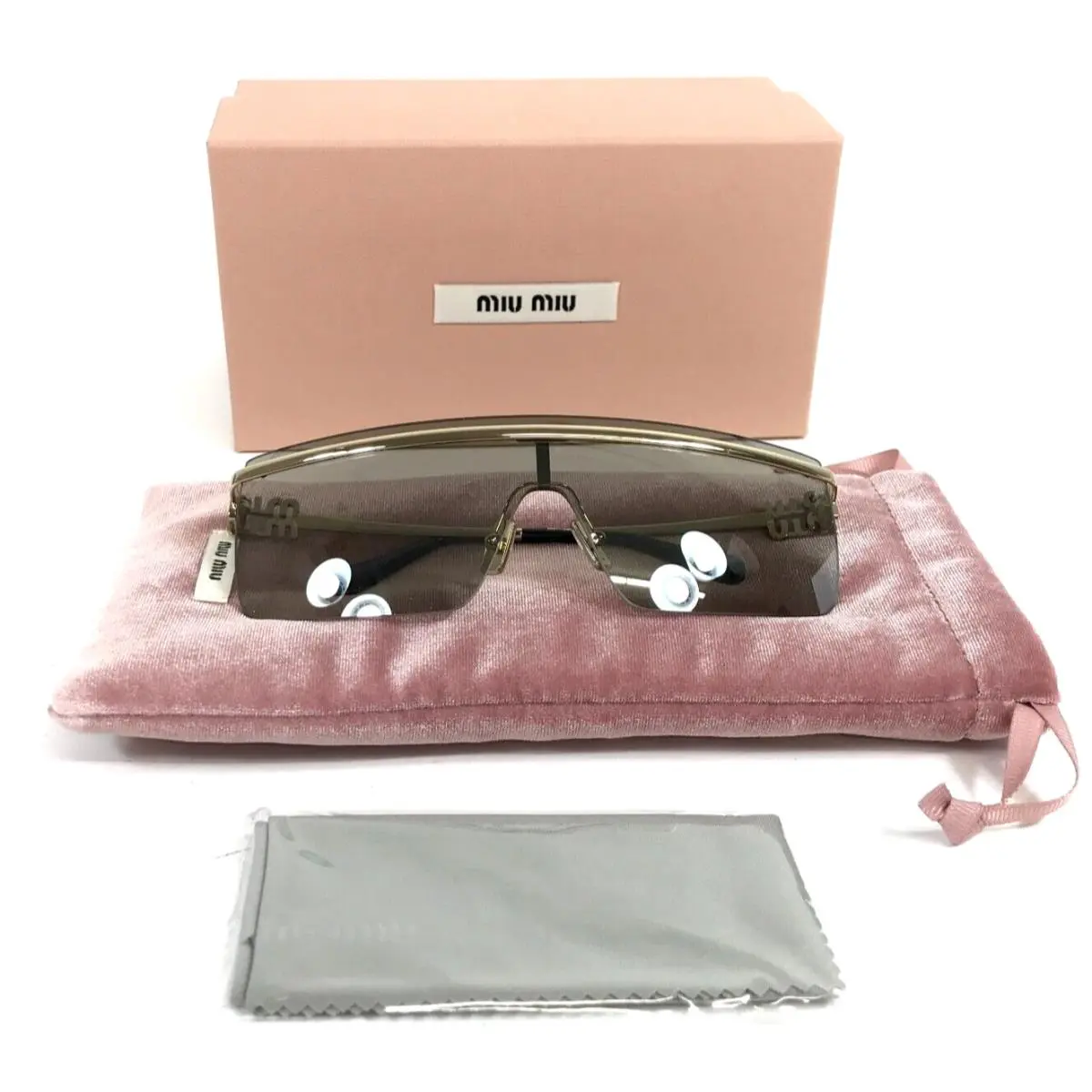 Sunglasses SMU50Z ZVN-112 Pale Gold Frames with Light Grey Shield Lens by Miu Miu