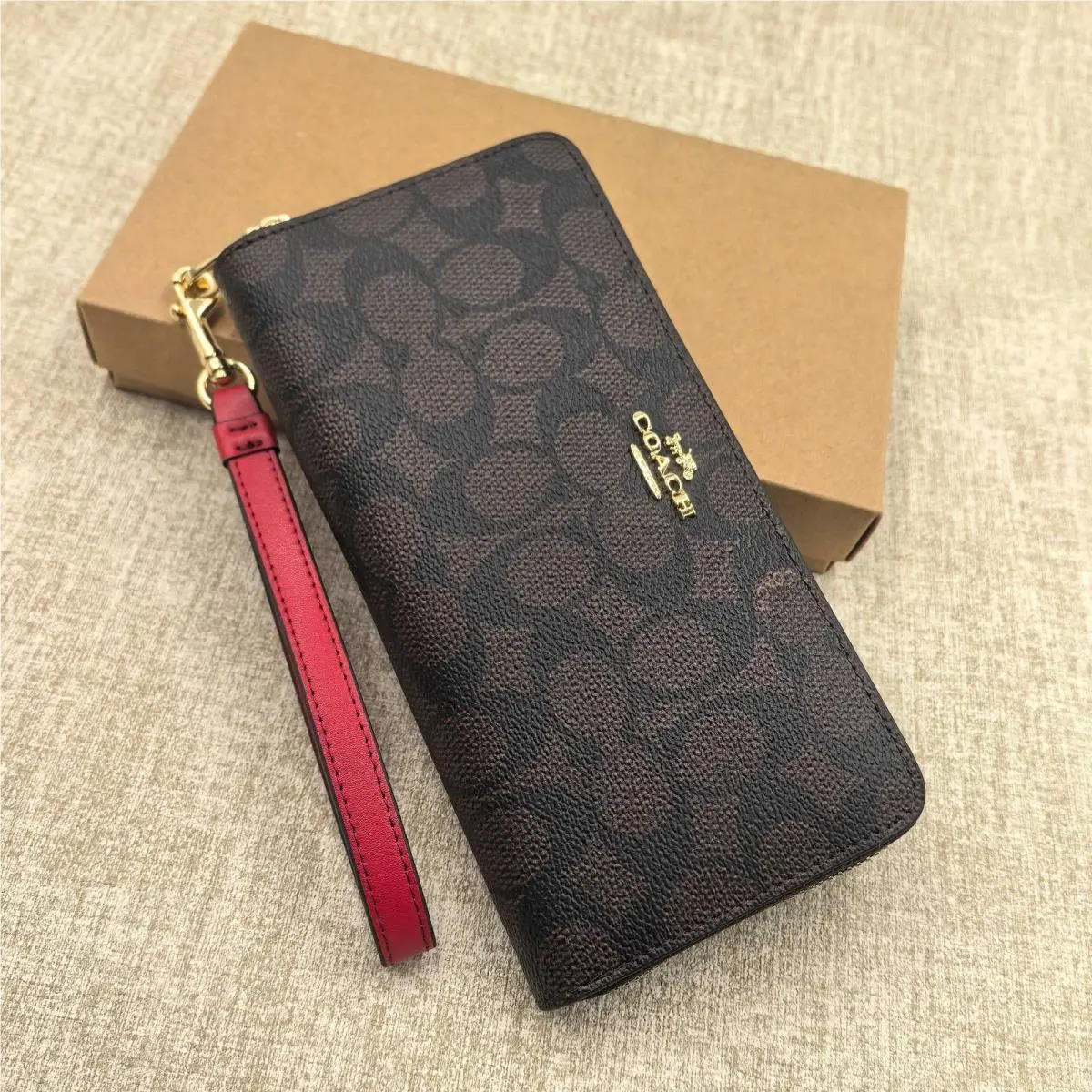 CW778 Long Zip Around Wallet in Signature Canvas Walnut and Bold Red by Coach