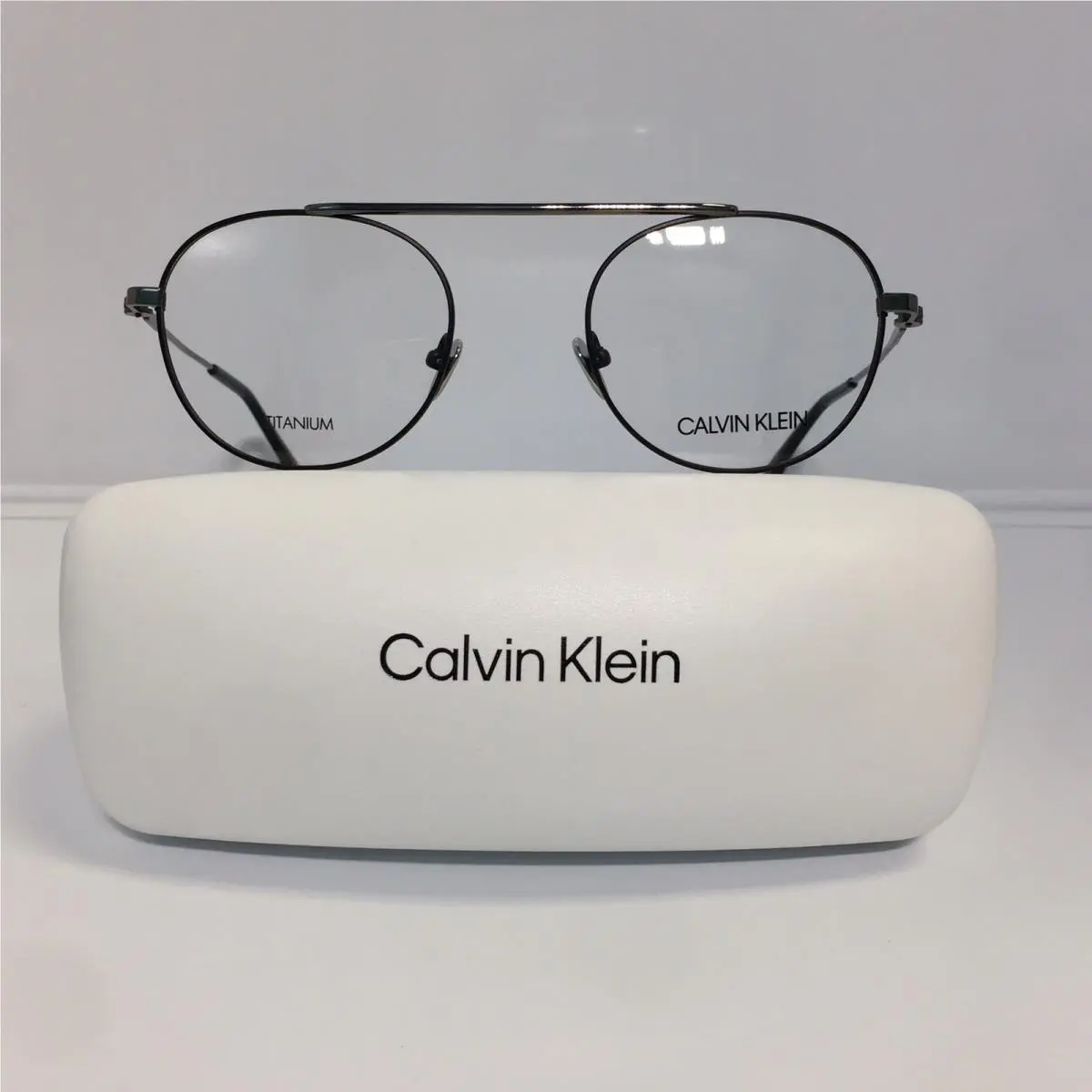 CK19151 001 Black Gunmetal Titanium Round Eyeglasses 50mm by Calvin Klein