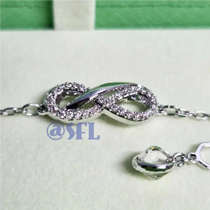 Swarovski Infinity Bracelet Silver Tone Clear Crystals Rhodium Plated