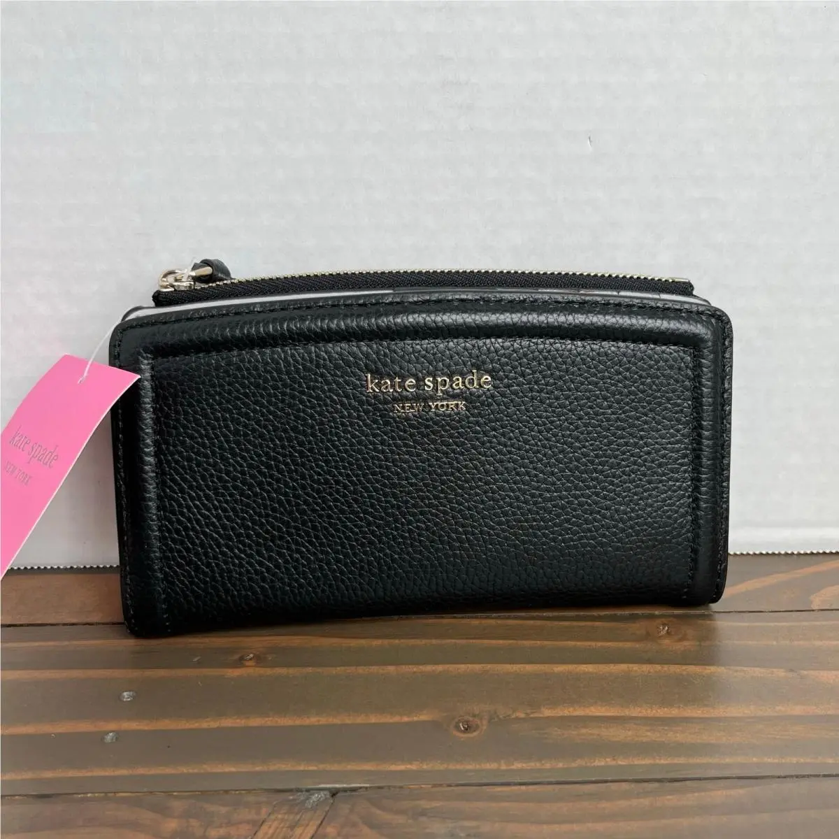 New York Knott Pebbled Leather Slim Bifold Wallet Black by Kate Spade