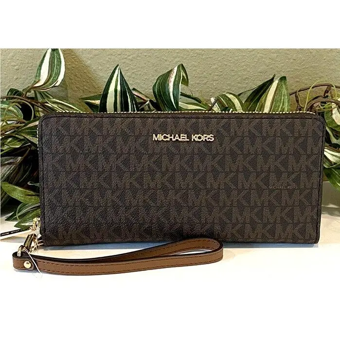 Jet Set Large Travel Continental Wallet Brown MK Signature Logo by Michael Kors