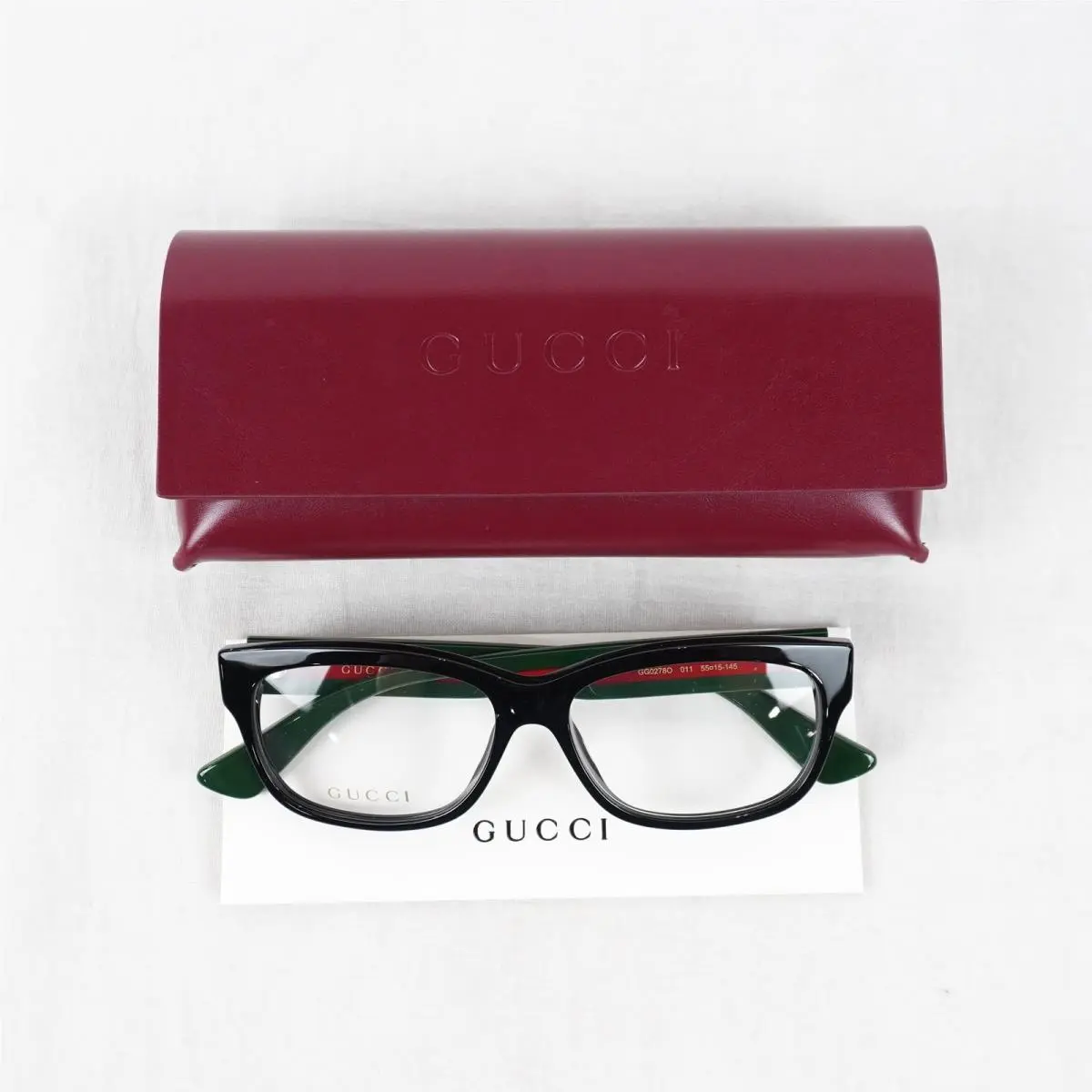 GG0278O Interlocking GG Eyeglass Frames In Green/red Web Stripe and Black by Gucci