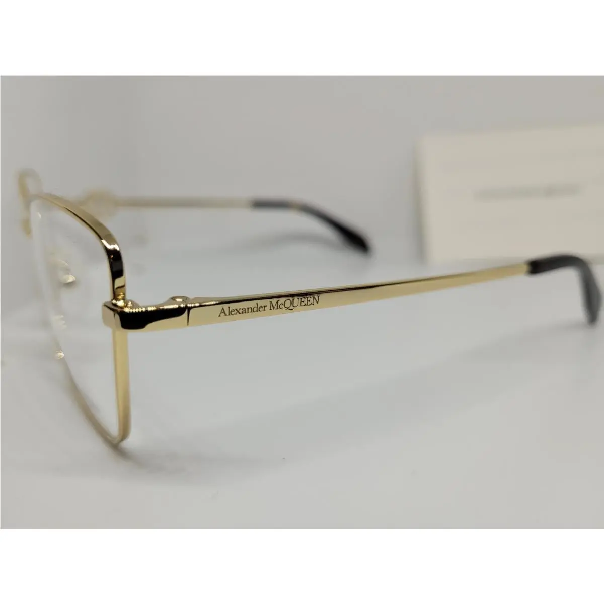 Alexander Mcqueen Women`s Eyeglasses Frames Case Model AM0290O 002 Gold/brown