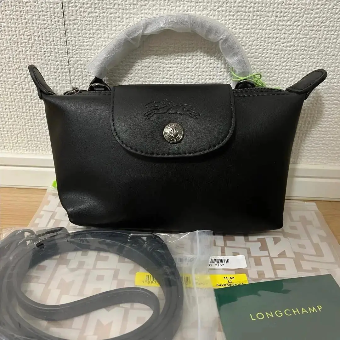 Le Pliage Pouch with Handle Black Leather Mini by Longchamp