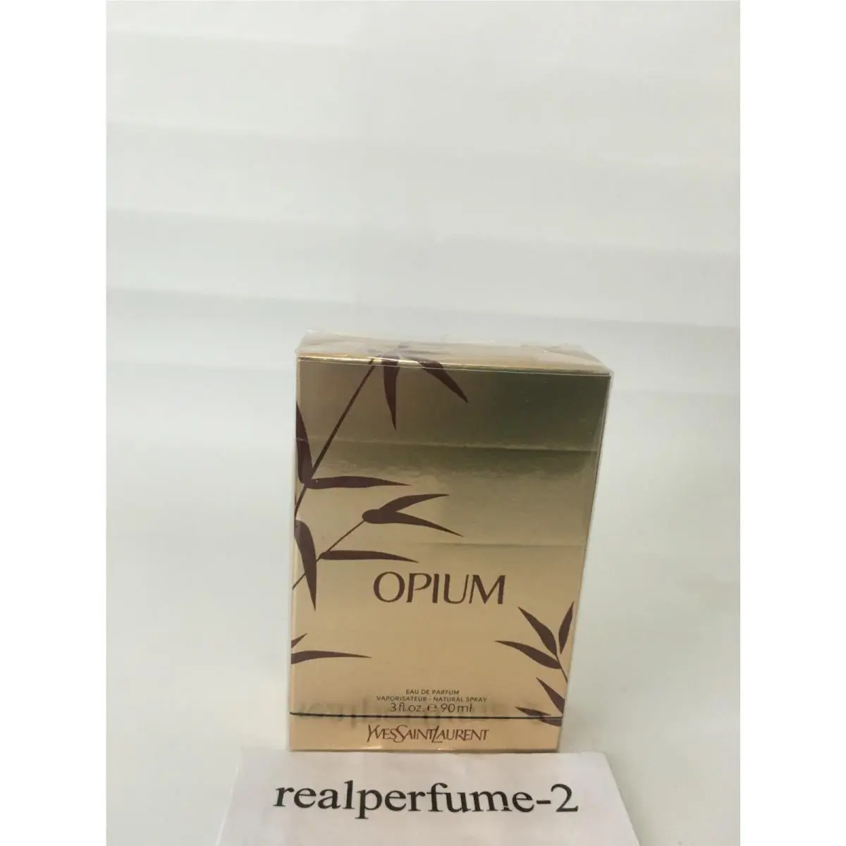 Opium Eau De Parfum Spray For Women 3 Ounce by Yves Saint Laurent. Real