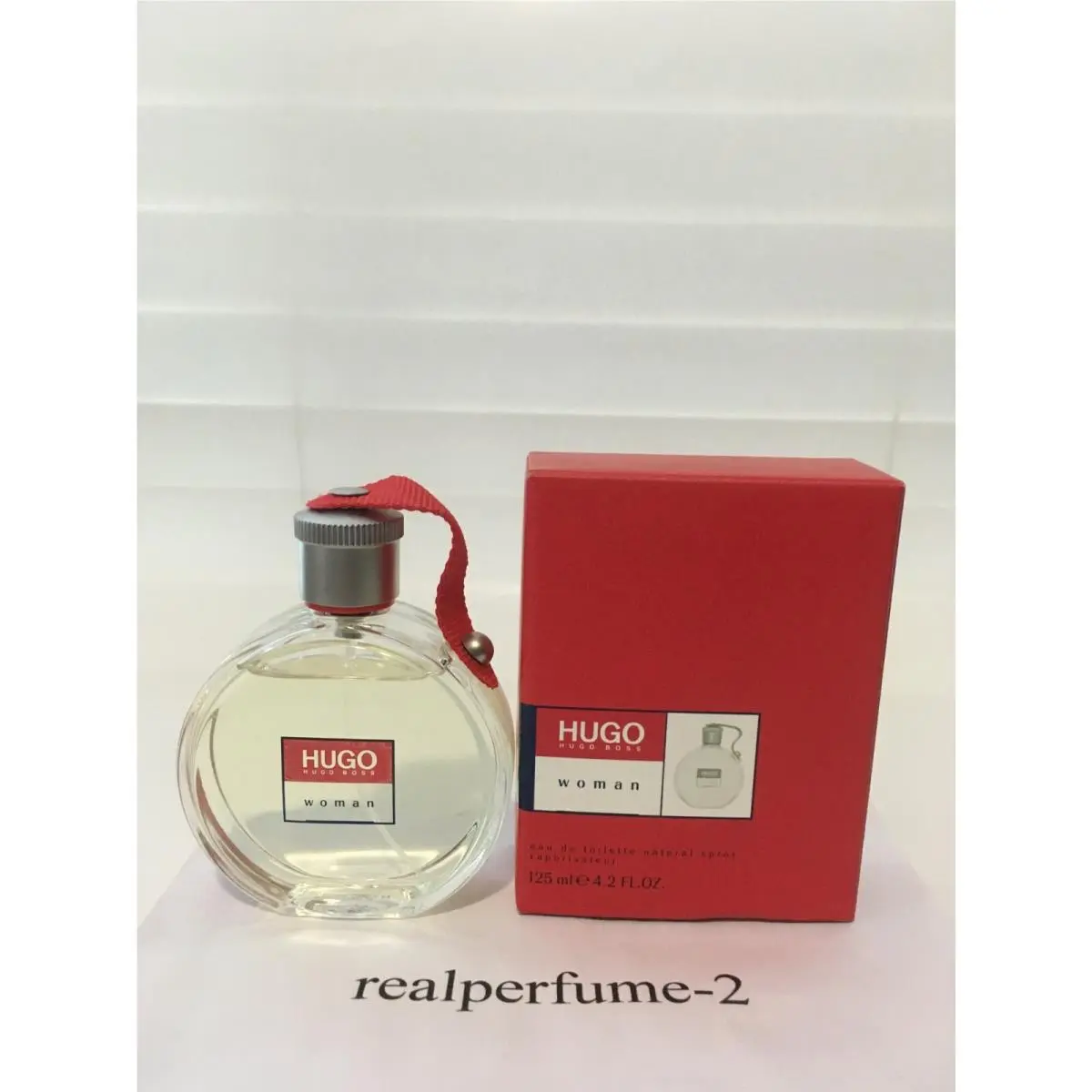 Red by Hugo Woman Eau de Toilette Spray 4.2 Fl.oz. Real by Hugo Boss