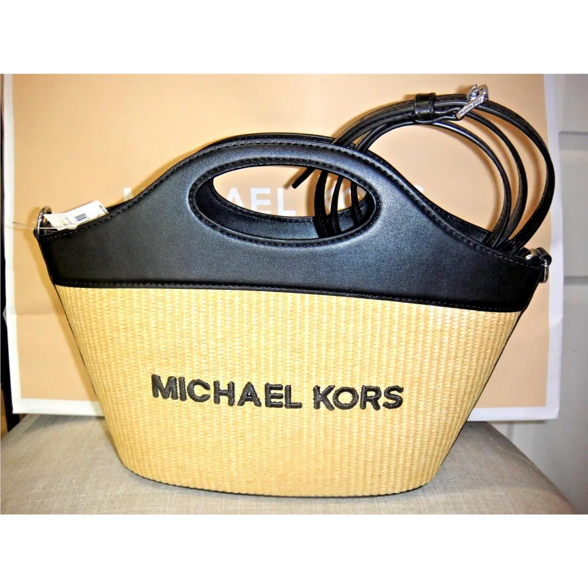 Tatum Medium Woven Convertible Crossbody Bag.$328.00.100% by Michael Kors