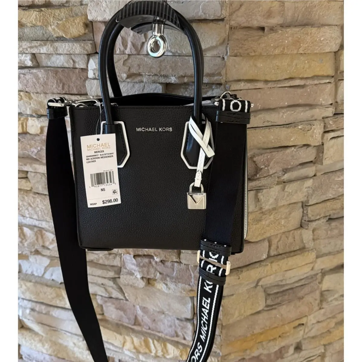 - Medium Leather Rare Logo Tape Accordion Crossbody Bag by Michael Kors