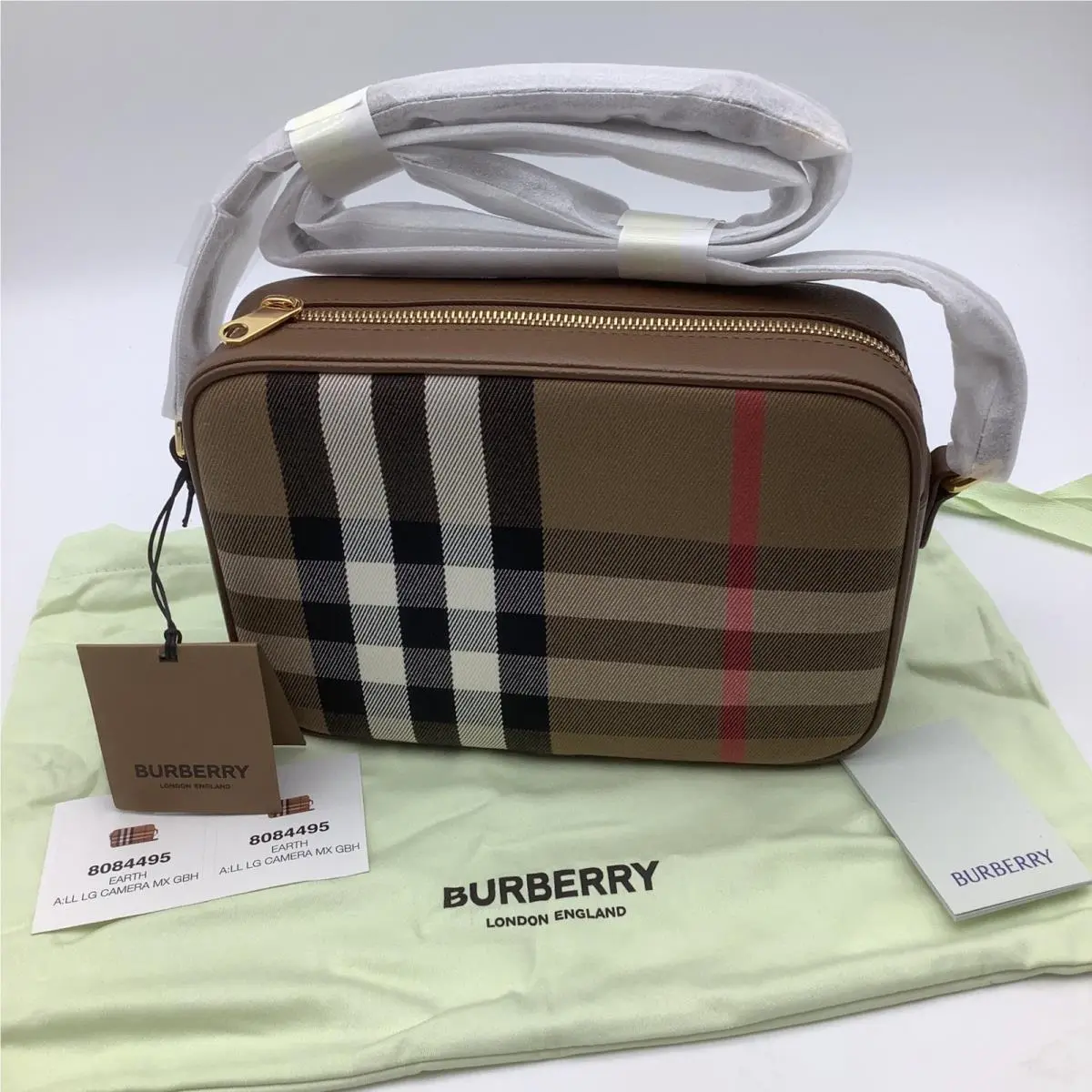 Check Camera Crossbody Bag Earth Brown Check Leather 8084495 by Burberry