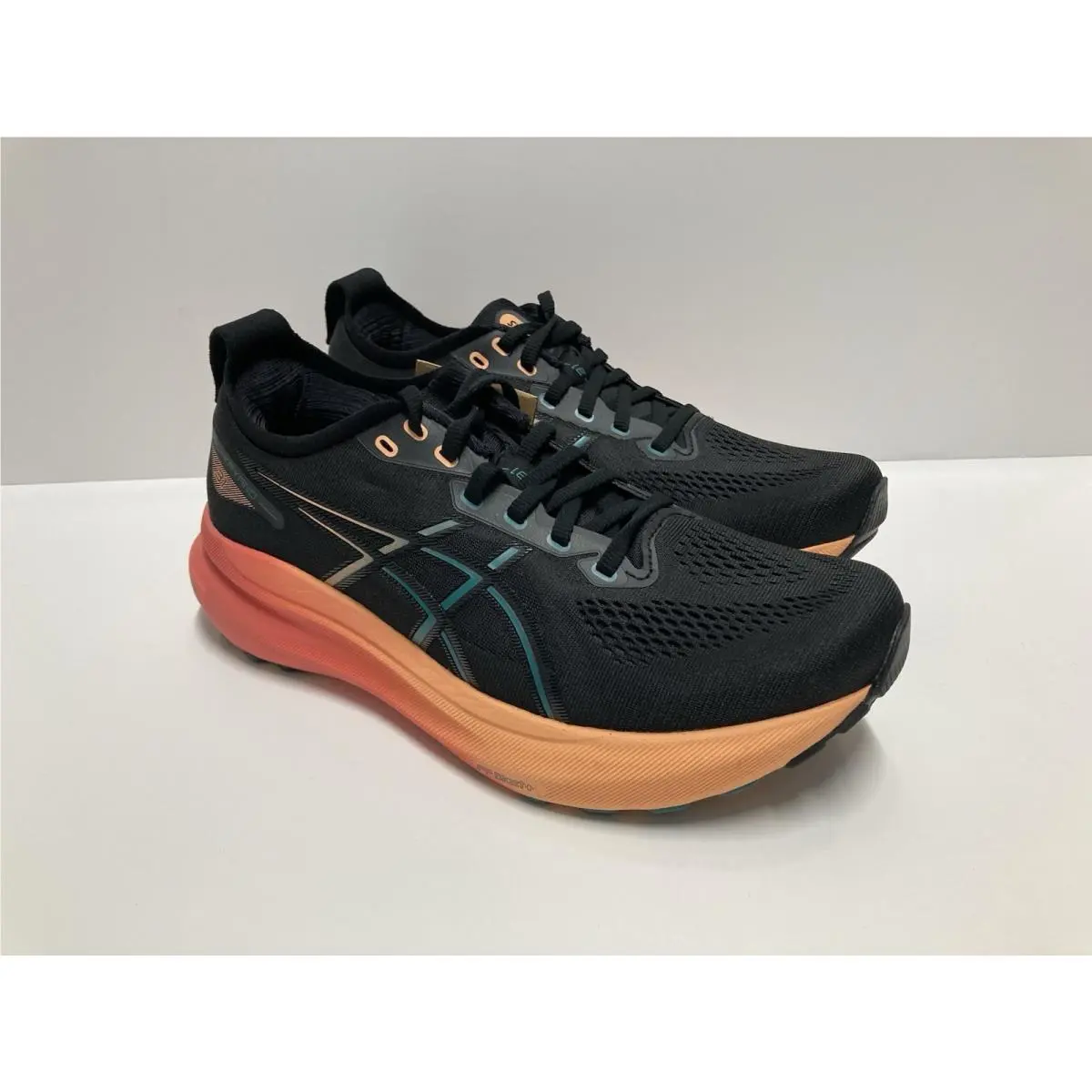 Asics Gel Kayano 31 Men’s Size 7 Black Rainy Lake Orange