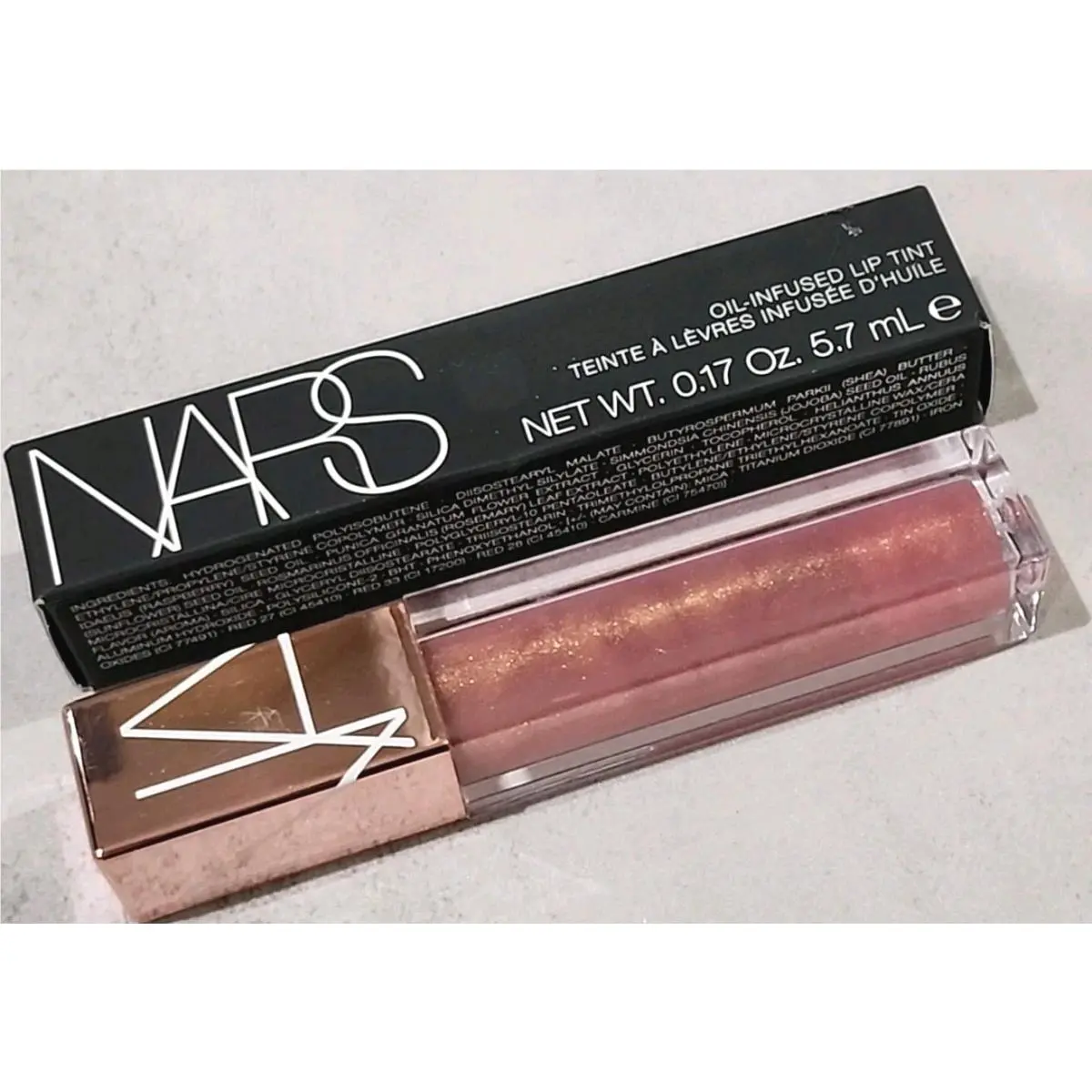 Nars Oil-infused Lip Tint in Orgasm 1154 - Size 0.17 Oz. / 5.7mL by NARS Cosmetics