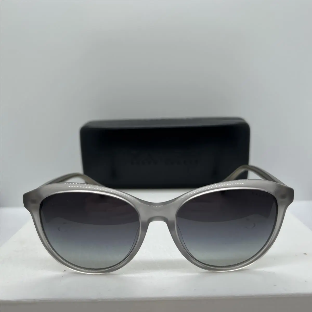 RA5336U Milky Grey Sunglass W/case 54/17/150 : B205 by Ralph Lauren
