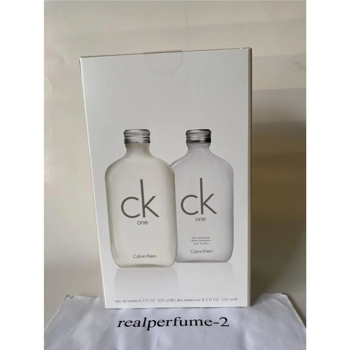 Ck One  Edt Spray 6.7 oz + Skin Moisturizer 8.5 Oz. Real by Calvin Klein