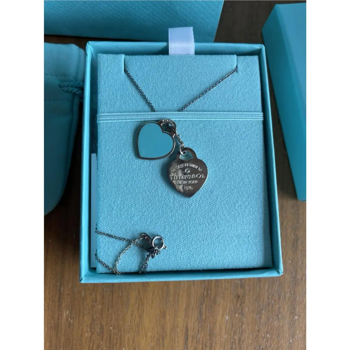 Return To Tiffany Blue Double Heart Tag Pendant In Silver with A Diamond by Tiffany & Co.