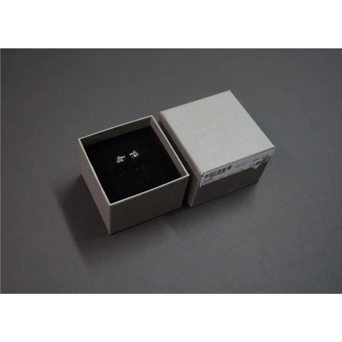 Alexander Mcqueen Men Gunmetal Thin Twin Skull Band Ring by Alexander McQueen