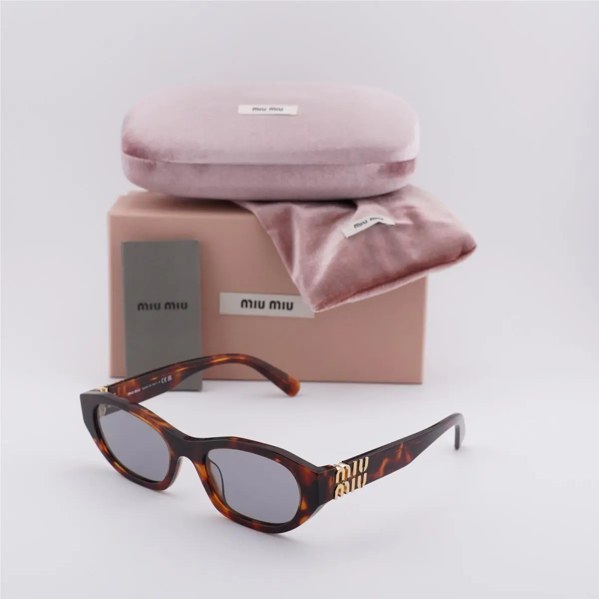 MUA03S 21C40O Havana Mahogany/grey 53-19-140 Sunglasses by Miu Miu