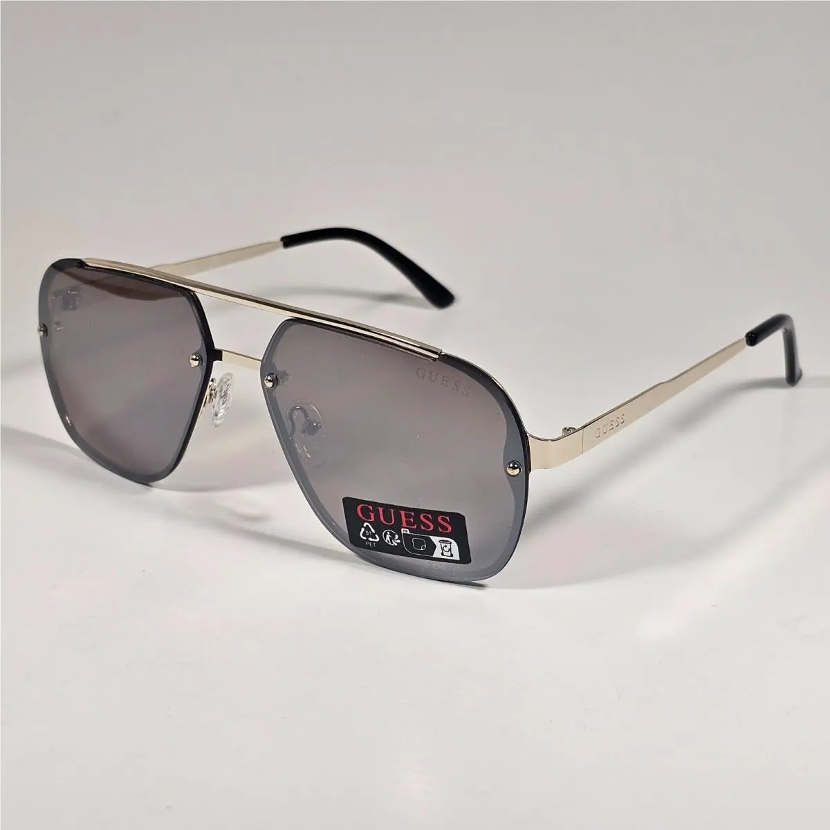 GO00065 32G Rimless Pilot Sunglasses Gold Frame Brown Gray Flash Lens 60mm by Guess