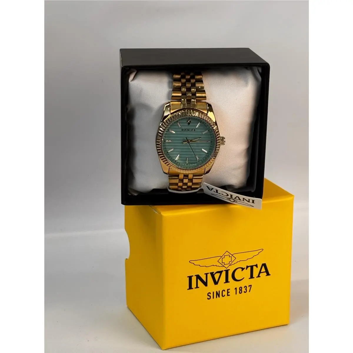 69174 Gold Tone Watch Turquoise Blue Dial Bezel Men’s Quartz Box by Invicta