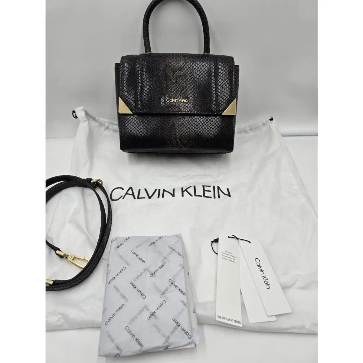 Black Python The Statement Series Fern Vegan Leather Crossbody by Calvin Klein