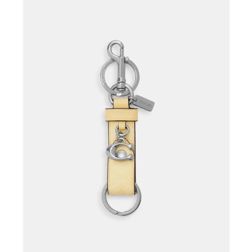 Trigger Snap Bag Charm in Signature Canvas Leather Color Hay by Coach