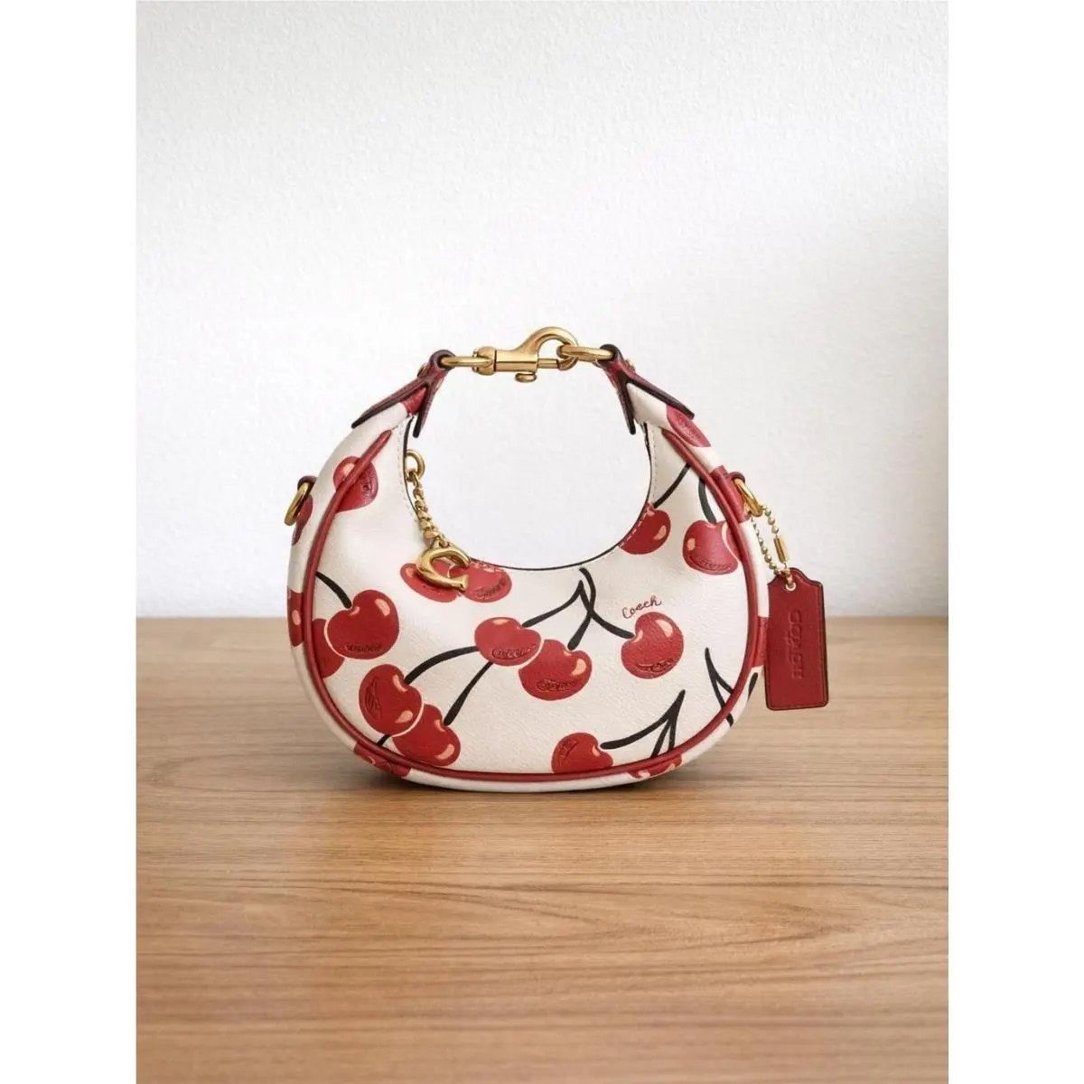 Jonie Leather Crossbody Bag with Cherry Print - Brass/chalk Multi by Coach