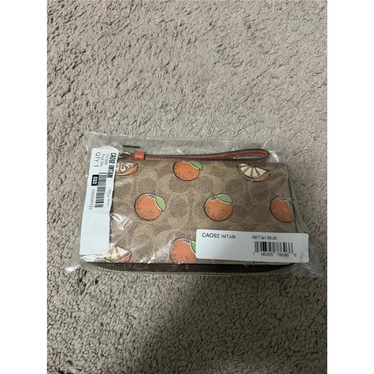 Long Zip Around Wallet In Signature Canvas with Orange Print CAO92 by Coach