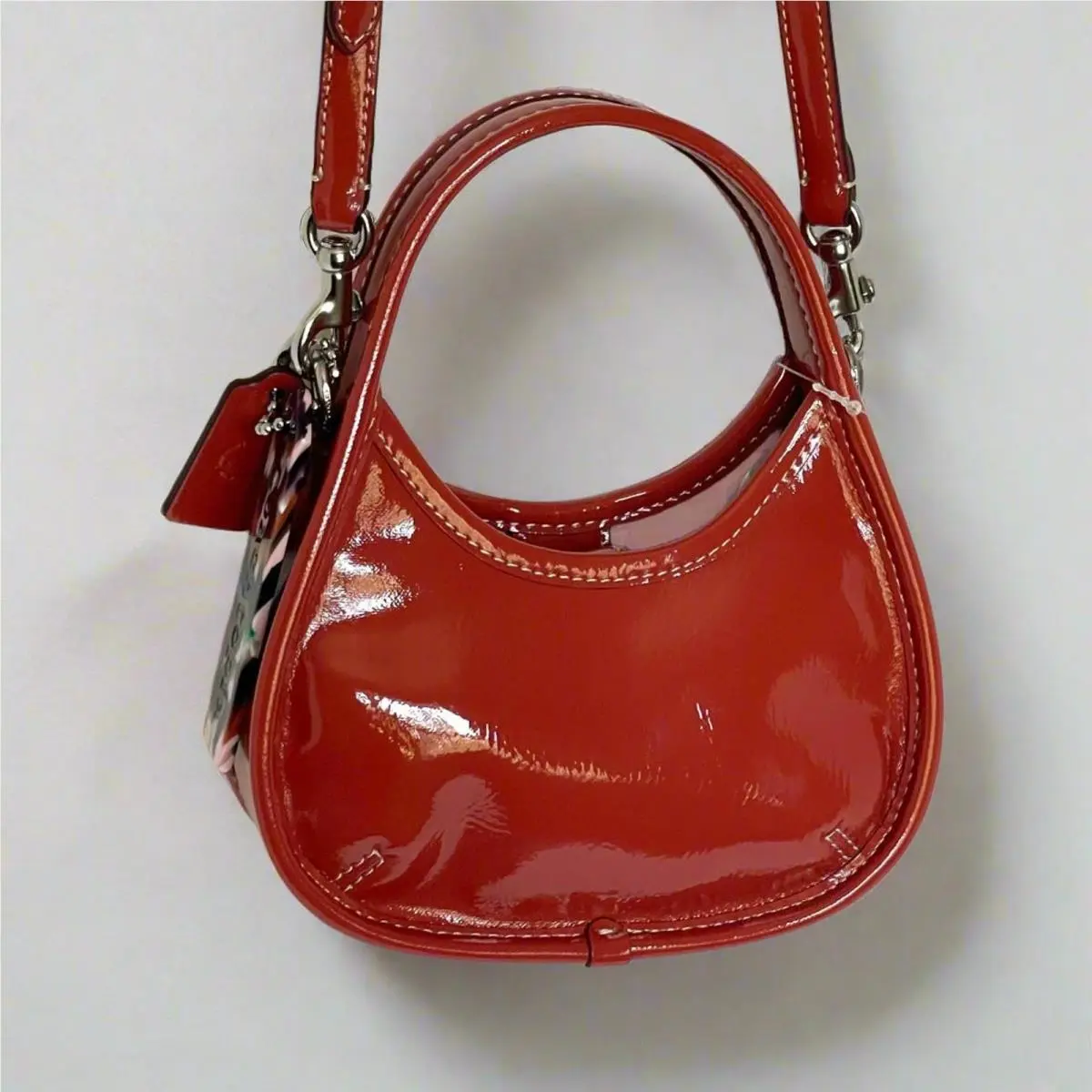 topia Mini Ergo Bag CQ832 Deep Orange Crinkle Patent Leather by Coach