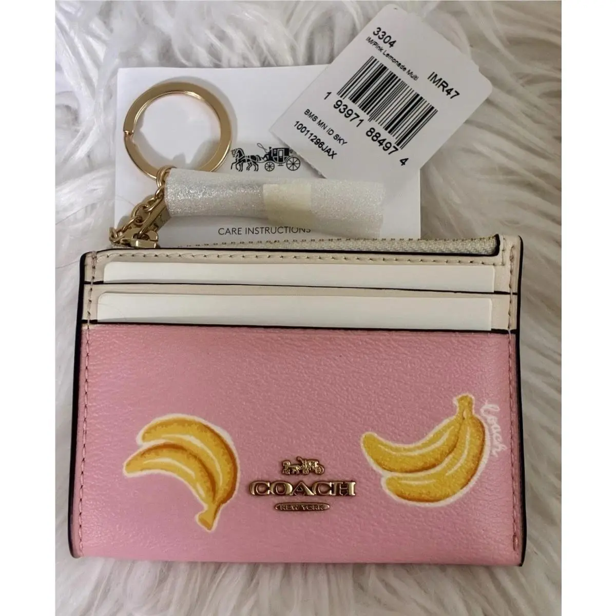 Mini Skinny ID Card Case Bag Charm with Banana Print In Pink Lemonade by Coach