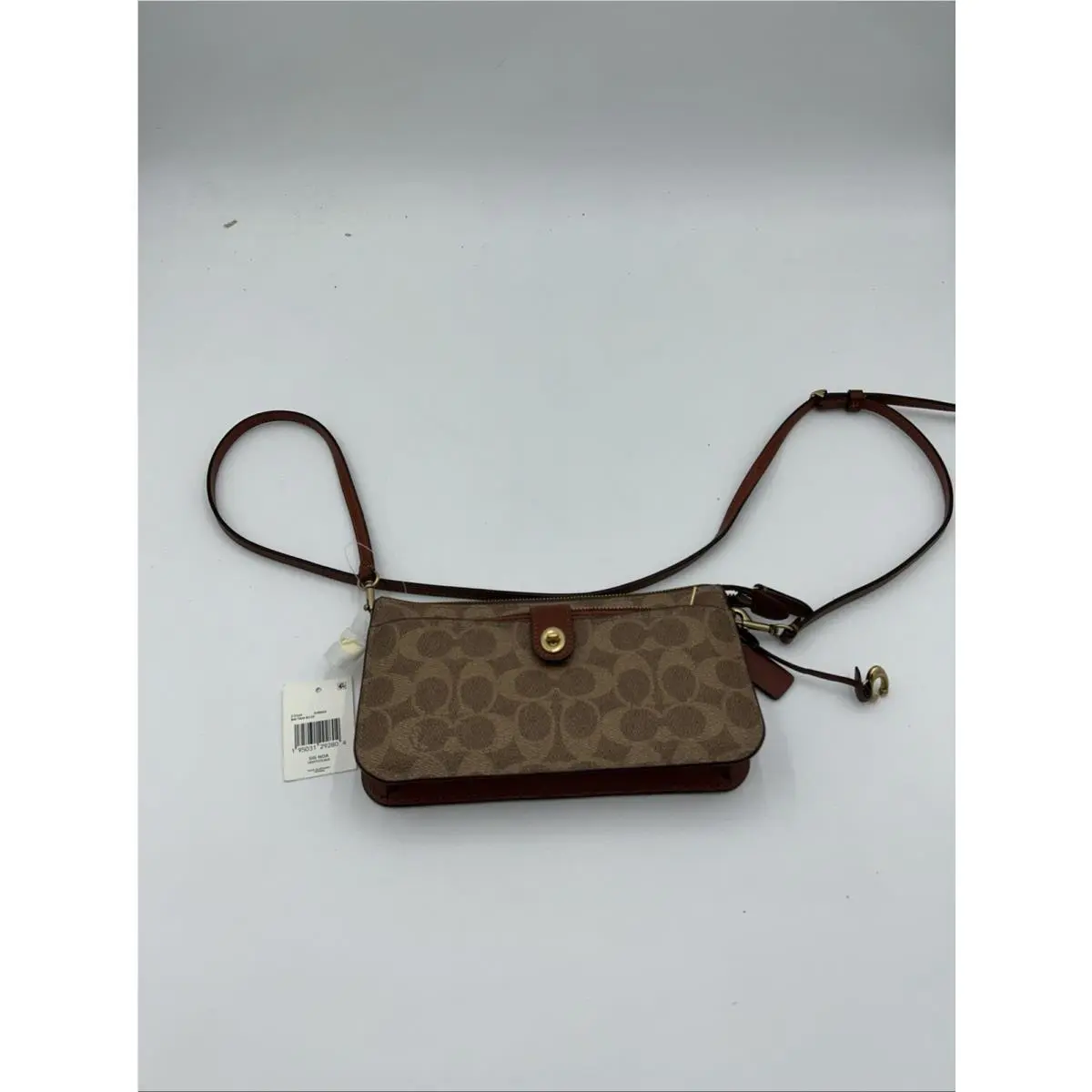 Noa Pop-up Messenger In Signature Canvas by Coach