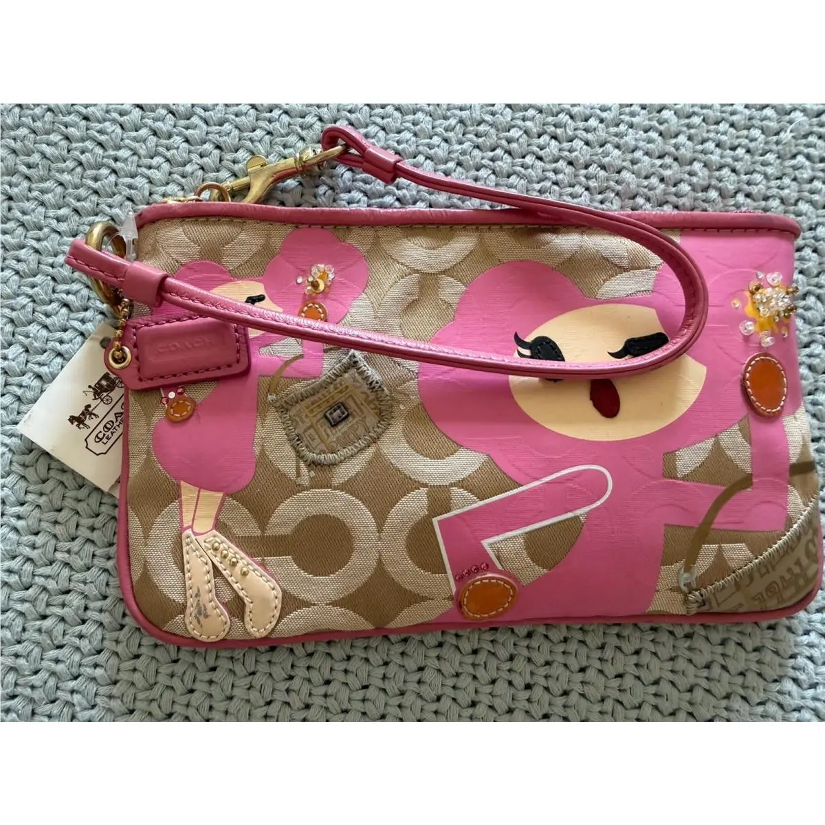 Pop Chan Pink Pinky Wristlet Signature C by Coach