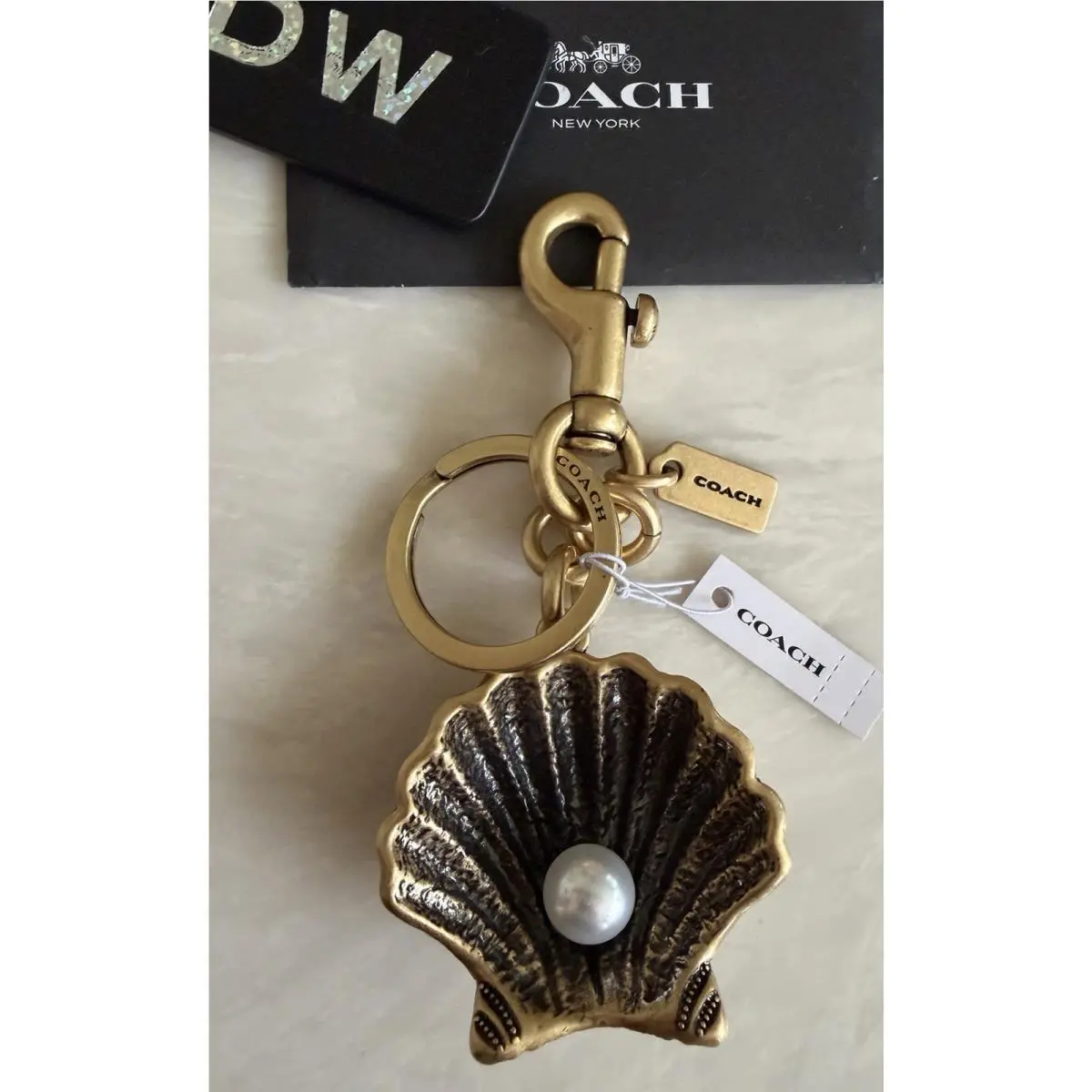 Brass Pearl Shell The Summer I Turned Pretty Bag Charm / Fob CBX54 by Coach