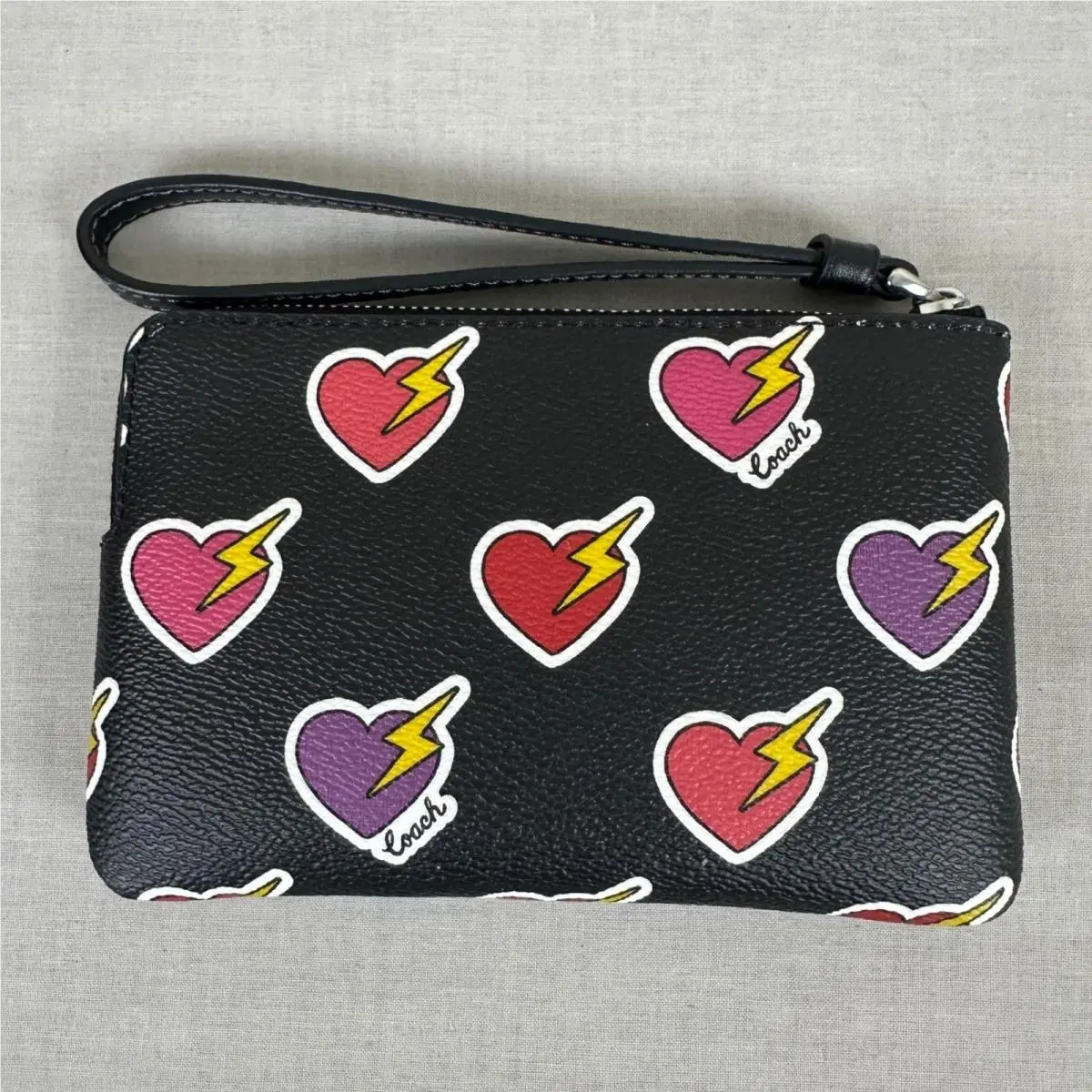 Women`s Small Wristlet Black Heart Lightning Bolt Print Leather by Coach