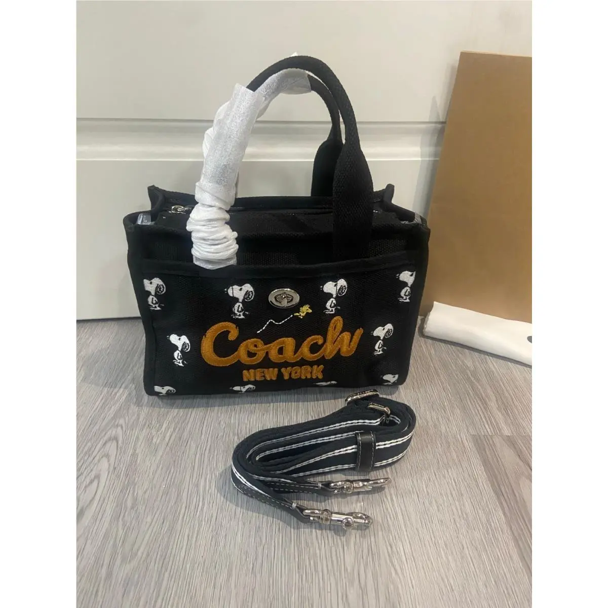 x Peanuts Cargo Tote Bag 26 Snoopy Print Black Multi CBF70 Outlet by Coach