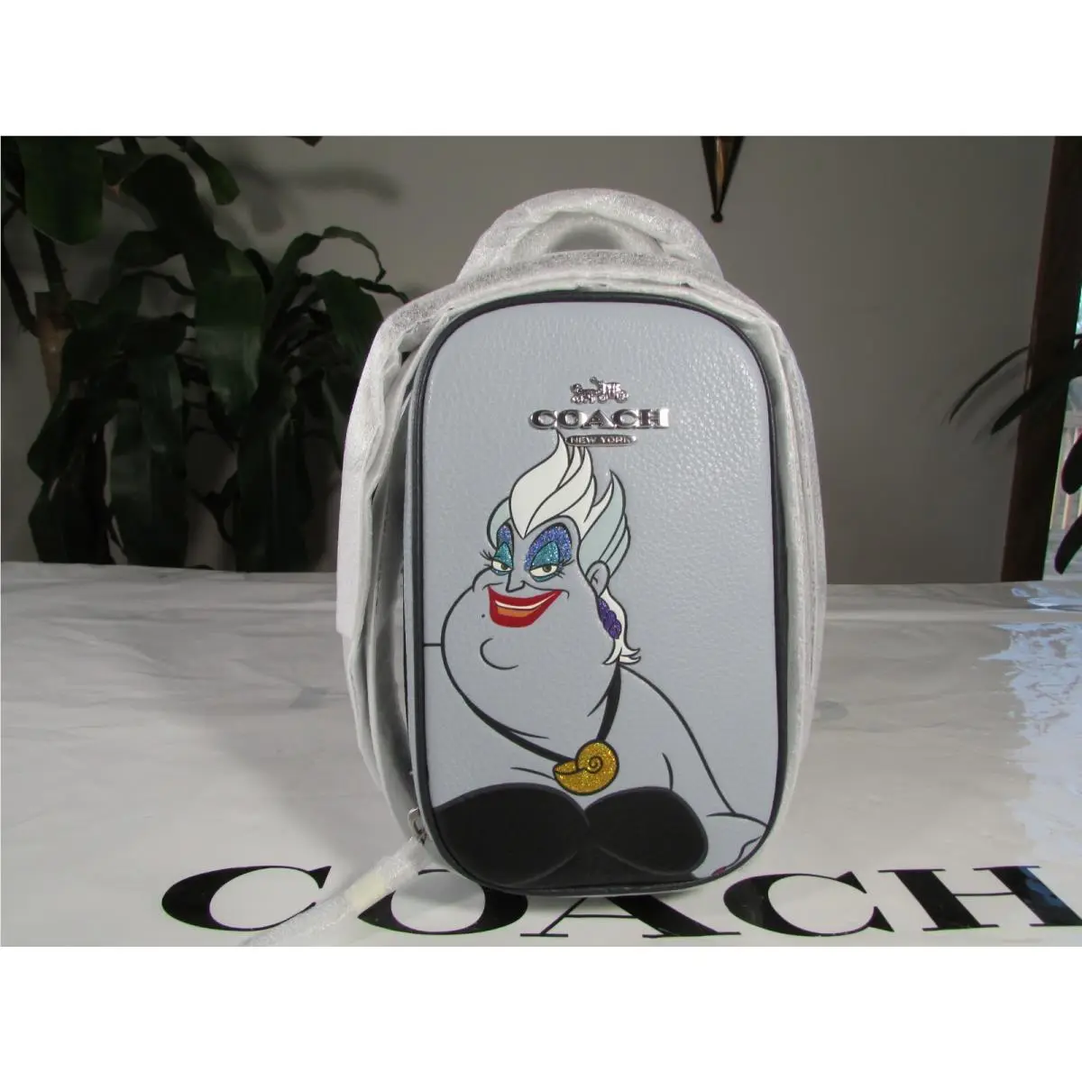 Leather Ursula Motif Disney X  Eva Phone Crossbody CC325 Ice Blue by Coach