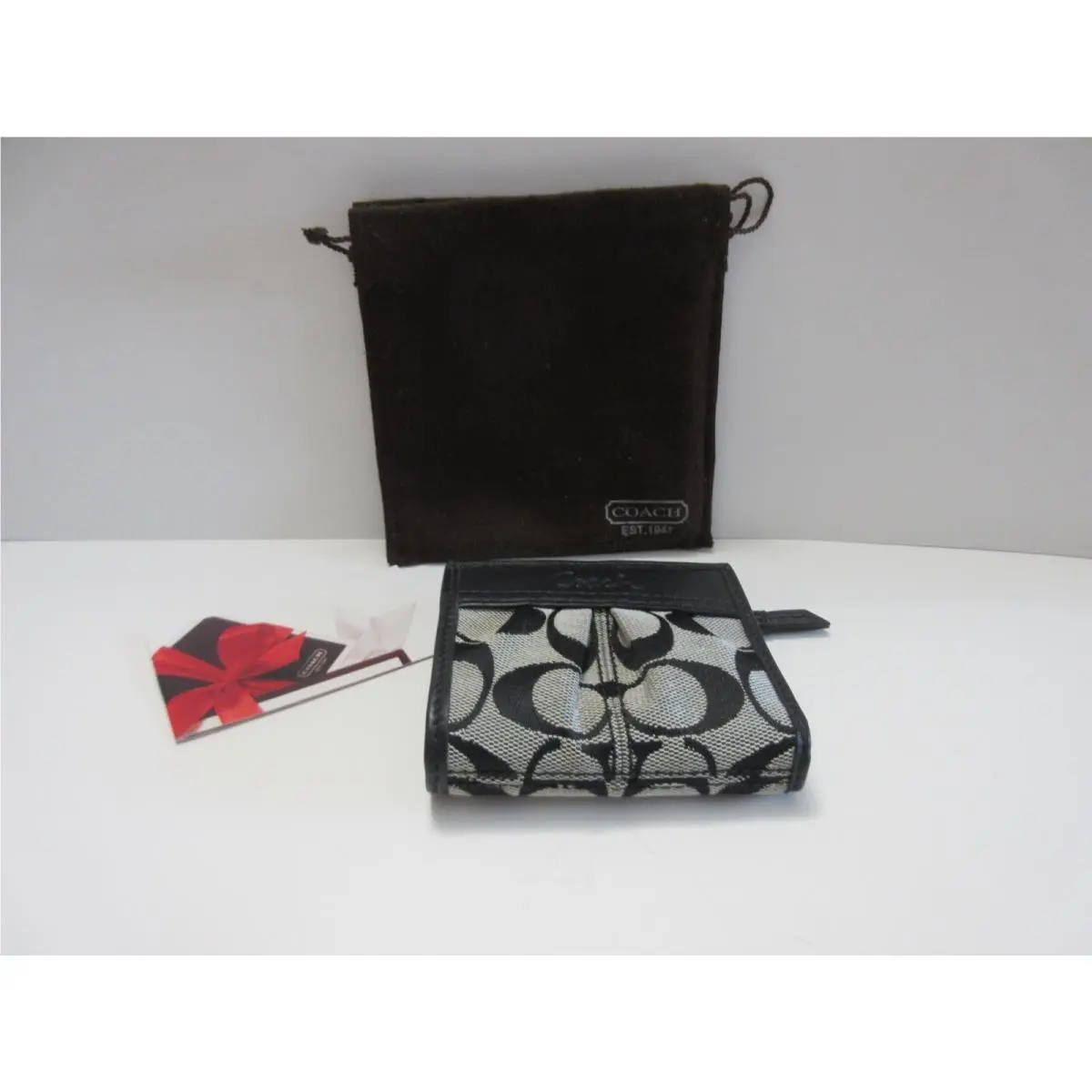 Soho Pleated Signature C`s Jacquard and Leather Mini Bifold Wallet by Coach