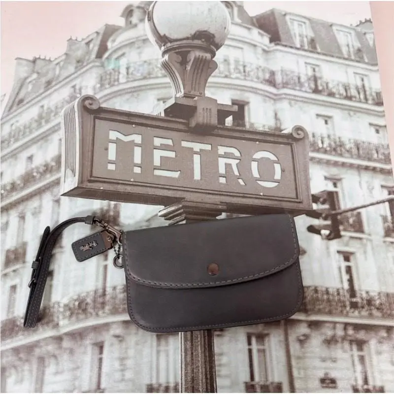 29770 Govetanned Clutch IN Cypress by Coach
