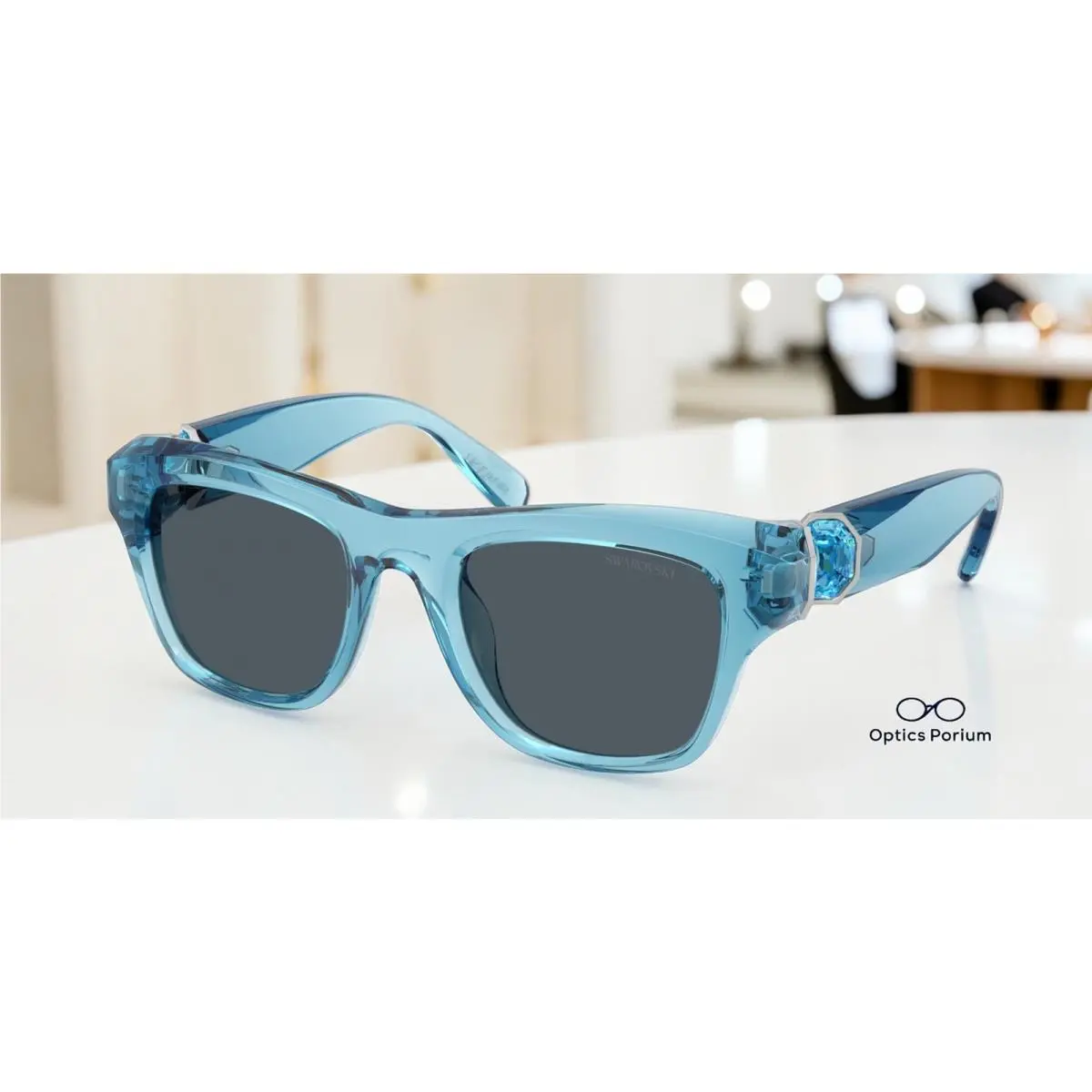 SK6056U 107887 Transparent Blue Dark Grey 50 mm Women`s Sunglasses by Swarovski
