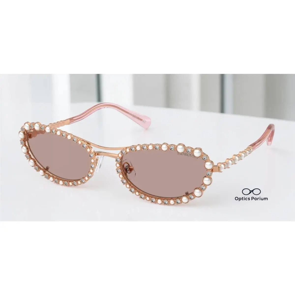 SK7044 40147N Rose Gold Light Purple Brown 56 mm Women`s Sunglasses by Swarovski