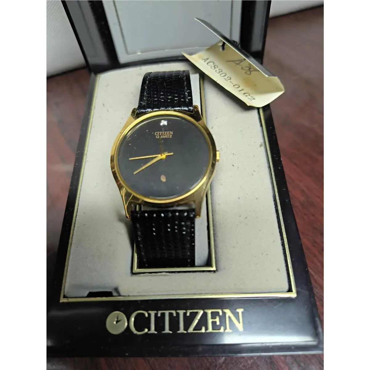 Vintage  Quartz Men`s Watch AC8302-01G Black Dial Gold Tone Old Stock by Citizen