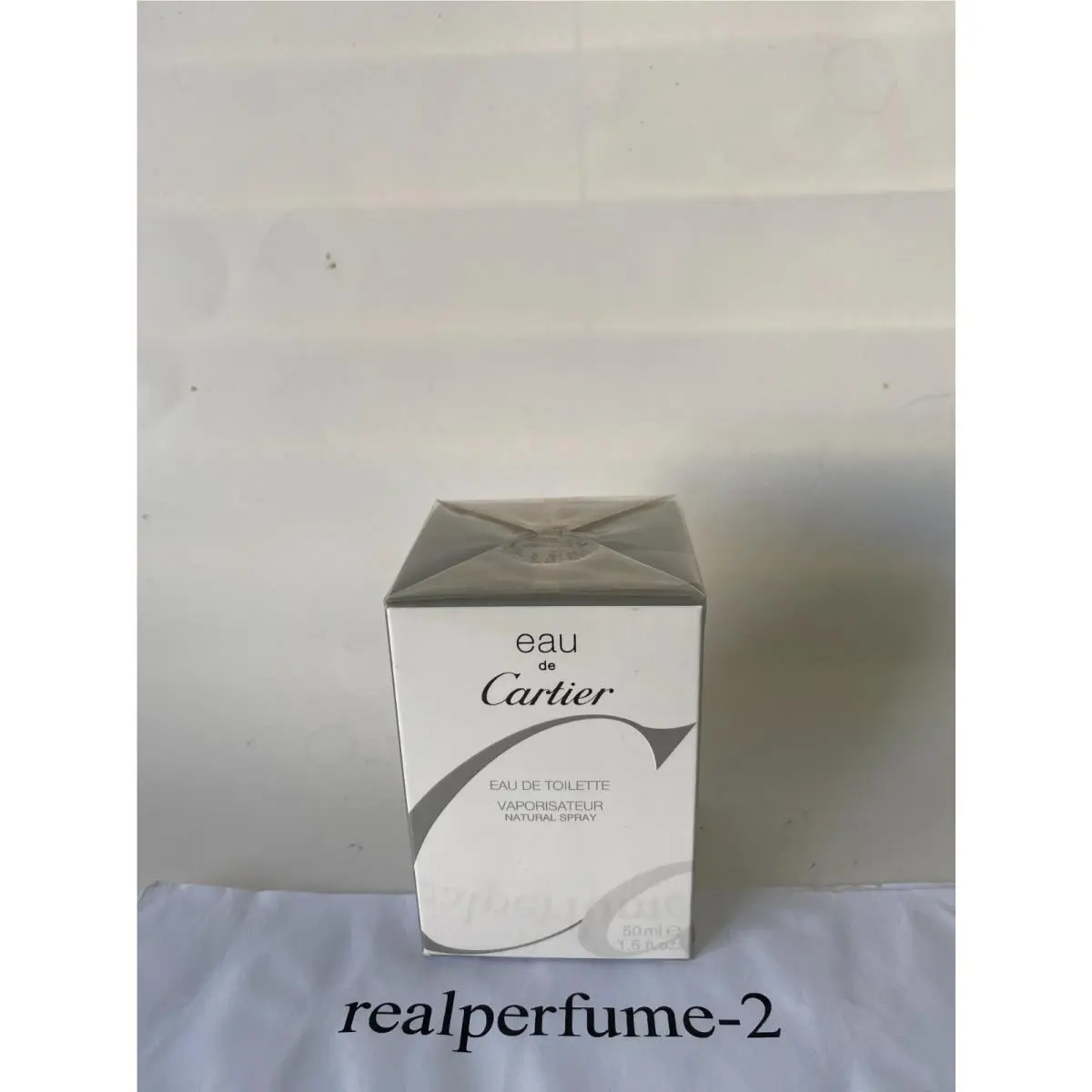 Eau DE  BY  1.6 oz Eau DE Toilette Spray Unisex. Real by Cartier