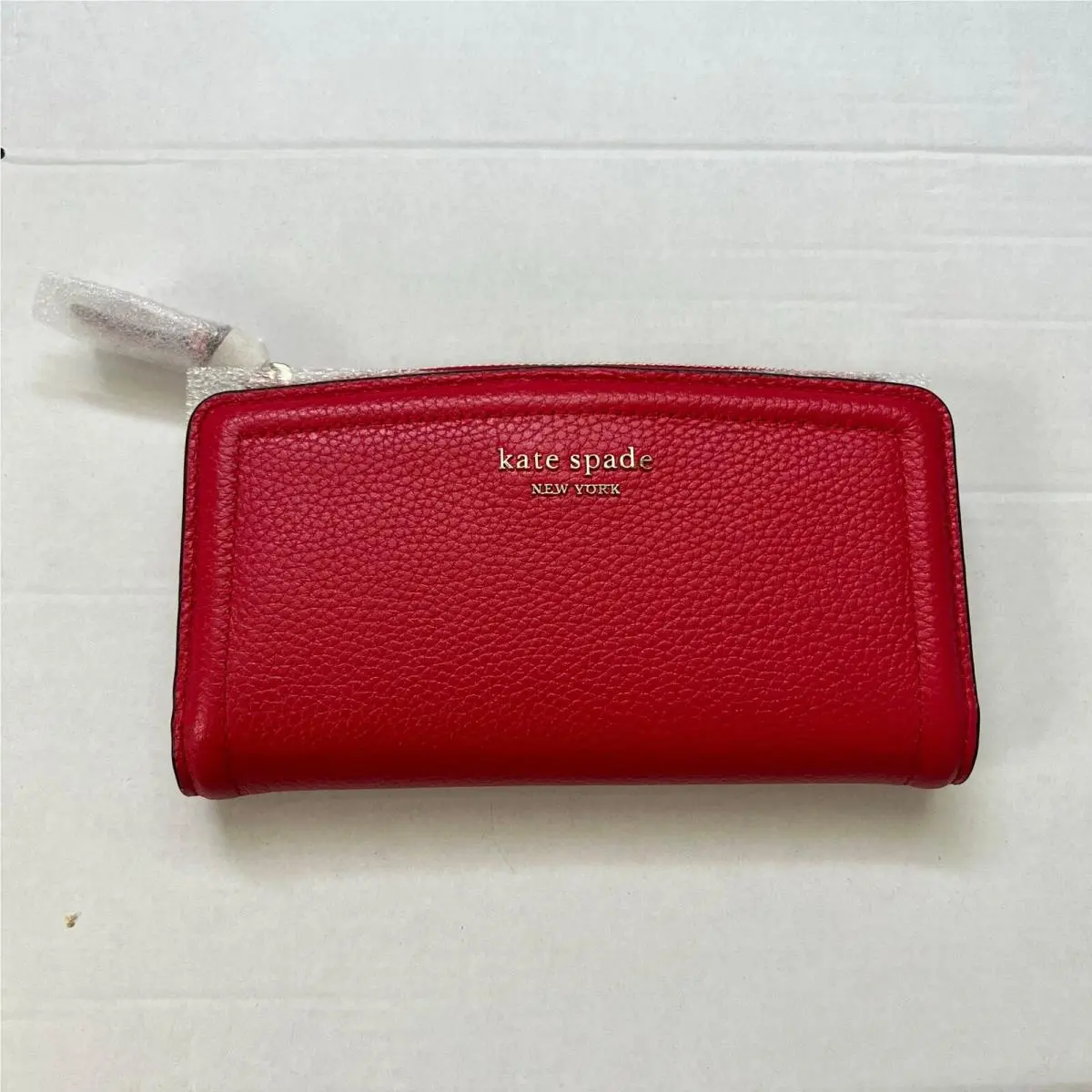 New York Slim Leather Zip Wallet by Kate Spade