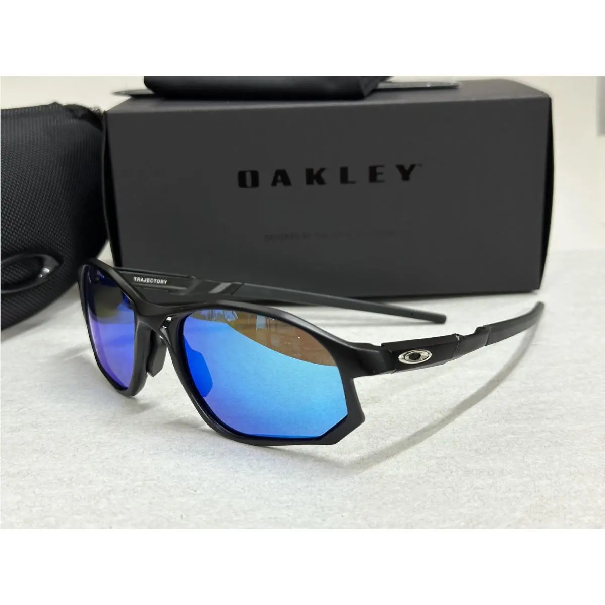 Glasses OX8171 Trajectory Black Frame Blue Polarized Lens by Oakley