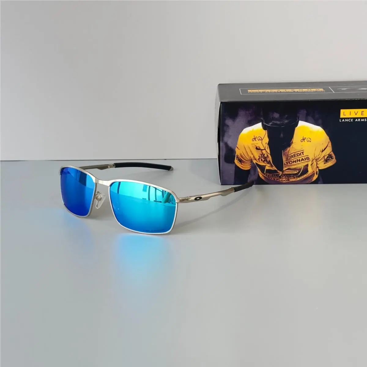 Conductor 8 OO4106 Sunglasses Silver Frame Sapphire Polarized Lens by Oakley